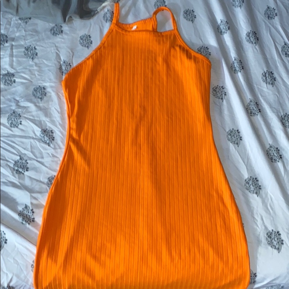 A orange body con sundress